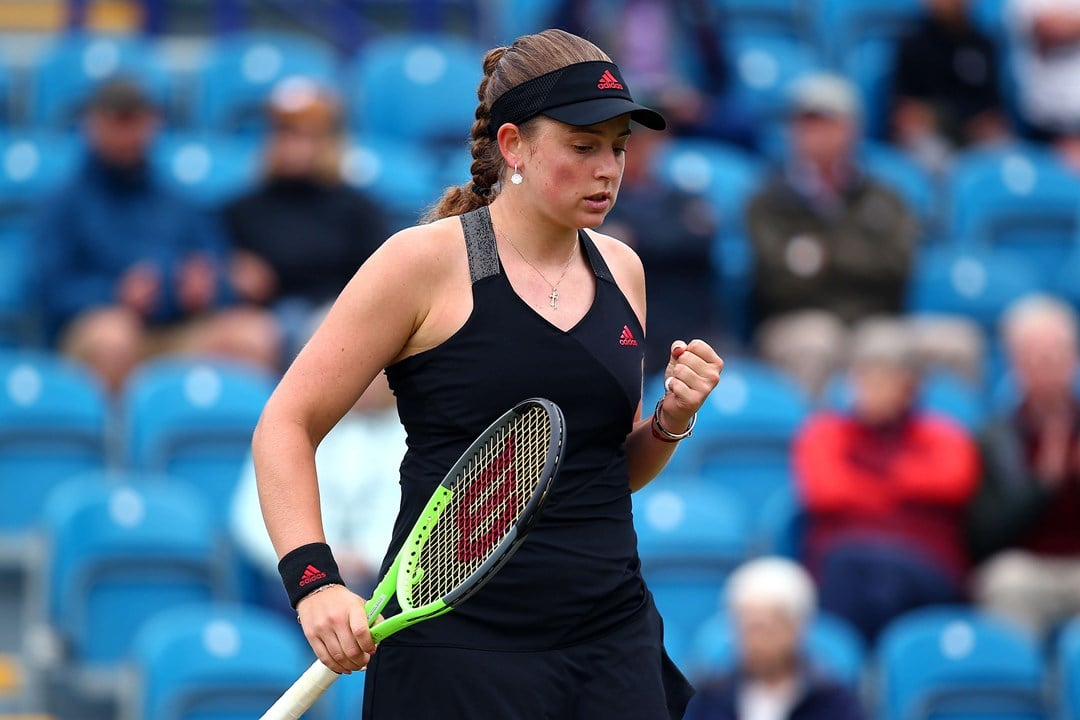 Jelena Ostapenko celebrating a winning tennis shot