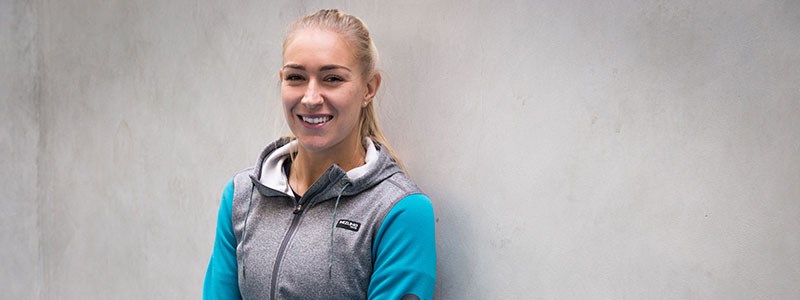header image of jocely rae smiling wearing blue and grey sweater