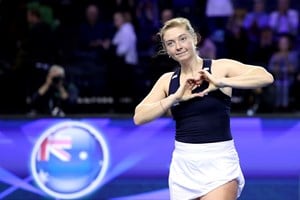 Alicia Barnett of Team Great Britain shows a heart to the fans following the Semi-Final match between Team Australia and Team Great Britain