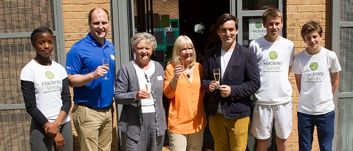 Group pose for a picture at the Hackney pavilion opening