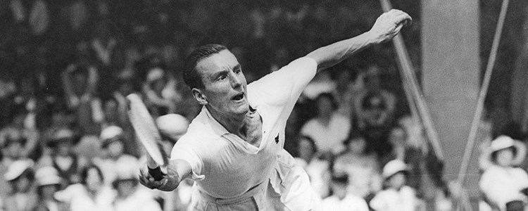 Fred Perry reaching for a forehand shot