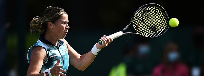 Sarah Beth Grey hitting a forehand