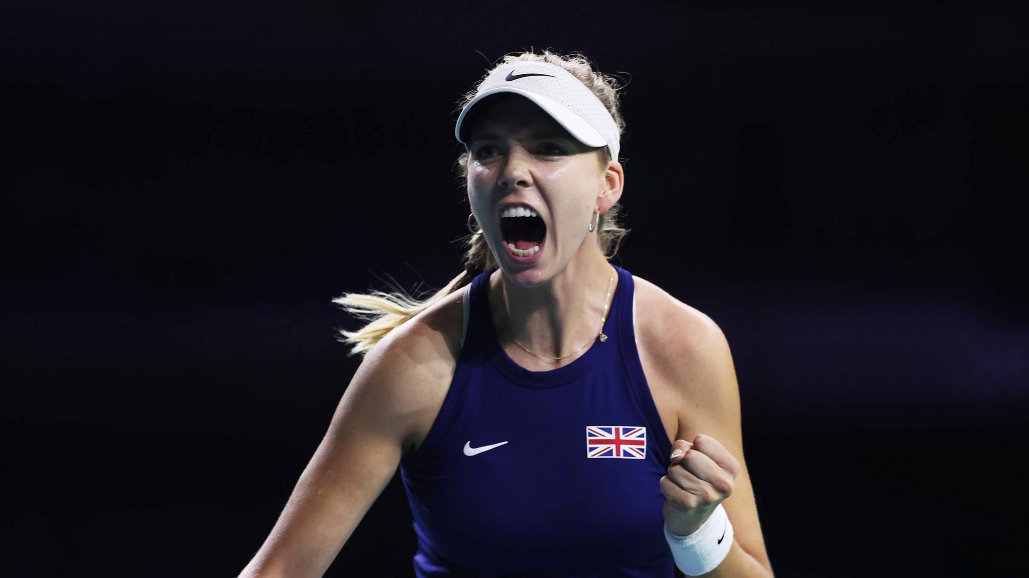 Katie Boulter celebrates winning the opening set against Rebecca Sramkova at the Billie Jean King Cup