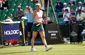 Lily Miyazaki smiling on court after her first WTA win in Nottingham