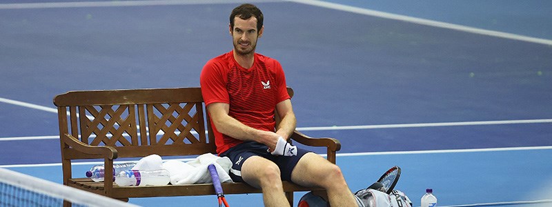 Andy Murray sitting on a bench
