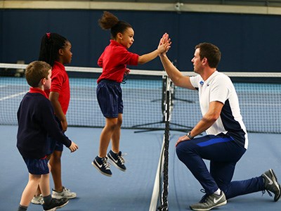 tennis4kids-training-highfive.jpg