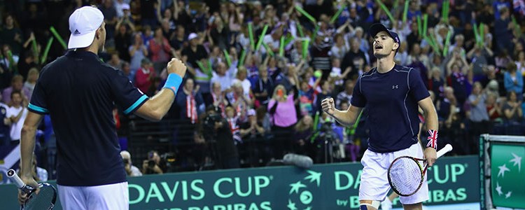 Dom Inglot and Jamie Murray celebrating on court at the Davis Cup
