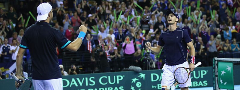 Dom Inglot and Jamie Murray celebrating on court at the Davis Cup