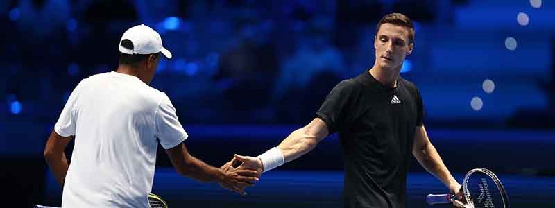 joe salisbury and rajeev ram shaking hands on court