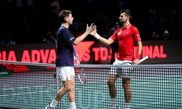Cam Norrie and Novak Djokovic shake hands at the Davis Cup Finals