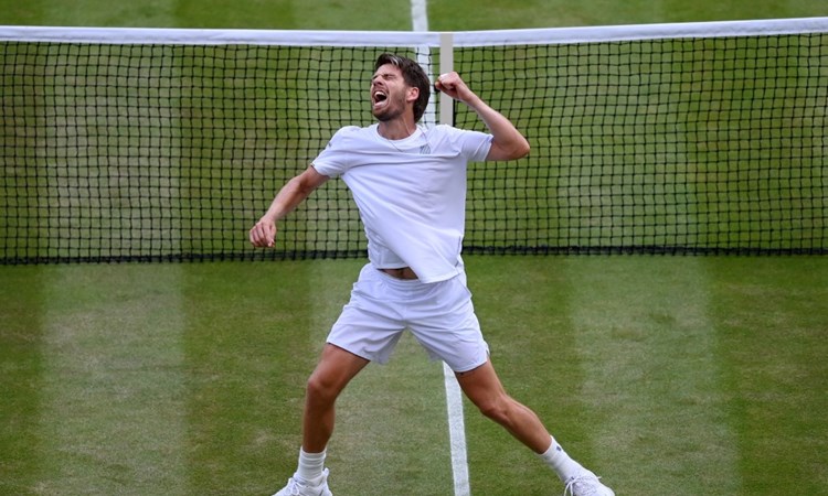 Cam Norrie celebrates reaching his first Wimbledon quarter-final
