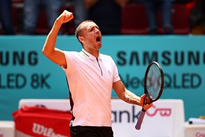 Dan Evans cheers after winning his second round clash at the 2022 Mutua Madrid Open