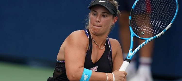 close up of Lucy Shuker hitting a backhand