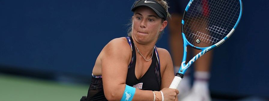 close up of Lucy Shuker hitting a backhand