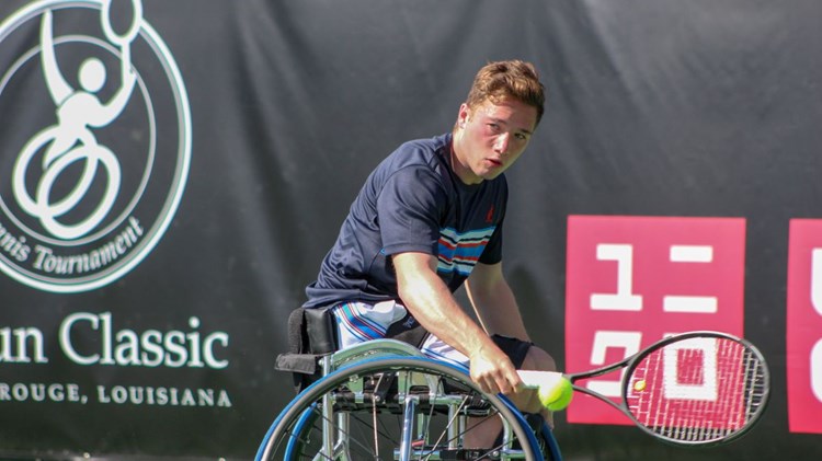 Alfie Hewett in action taking backhand shot