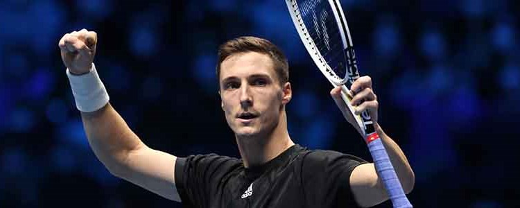 joe salisbury on court celebrating with hand in the air