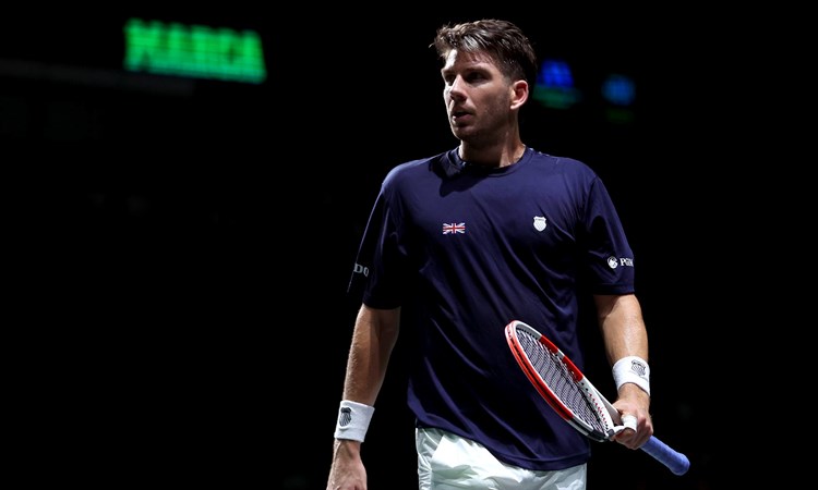 Cam Norrie in action against Nocak Djokovic at the Davis Cup Finals