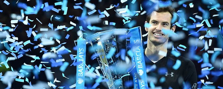 Andy Murray smiling with his trophy with confetti raining down
