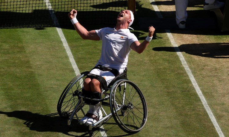 Alfie Hewett celebrates match point against Gustavo Fernandez during the Wheelchair Singles Semi Final match on day twelve of The Championships Wimbledon 2022