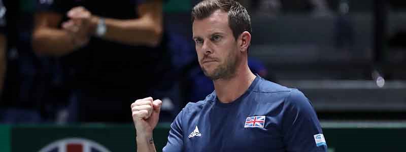 leon smith cheering wearing blue adidas top with GB flag on it