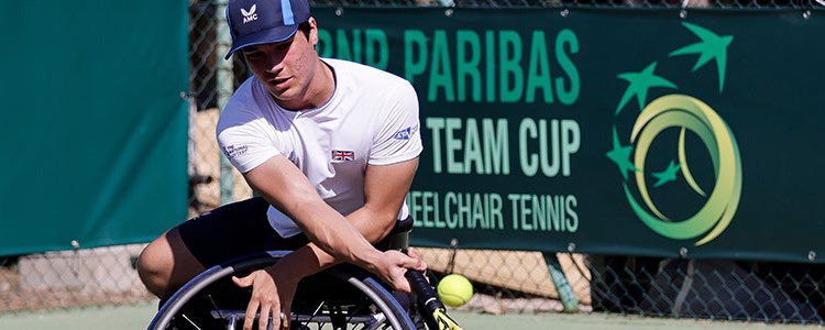 Dahnon Ward hitting a backhand at the World Team Cup