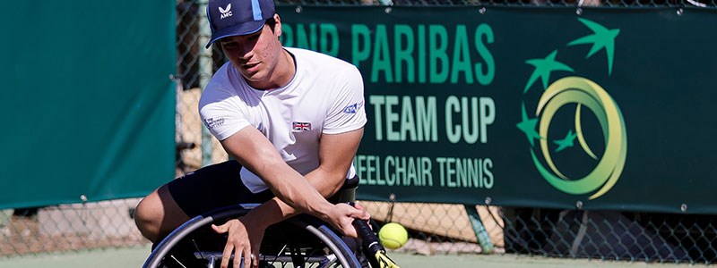 Dahnon Ward hitting a backhand at the World Team Cup