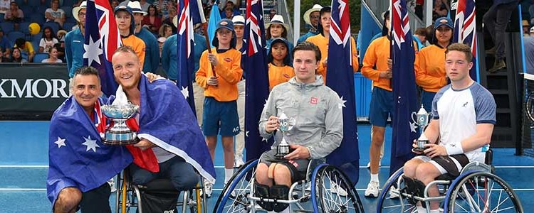 Gordon Reid and Alfie Hewett at the Australian Open smiling and holding their trophies with two other players