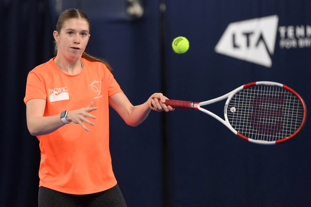 Para standing tennis player Georgia Routledge lines up a forehand