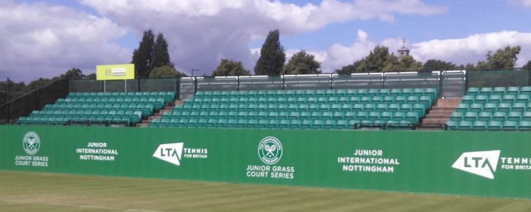 image of chairs and court at nottingham grass courts with lta tennis logo shown