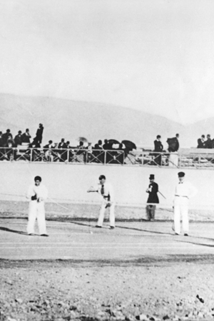 Colour Holder John Boland on a tennis court