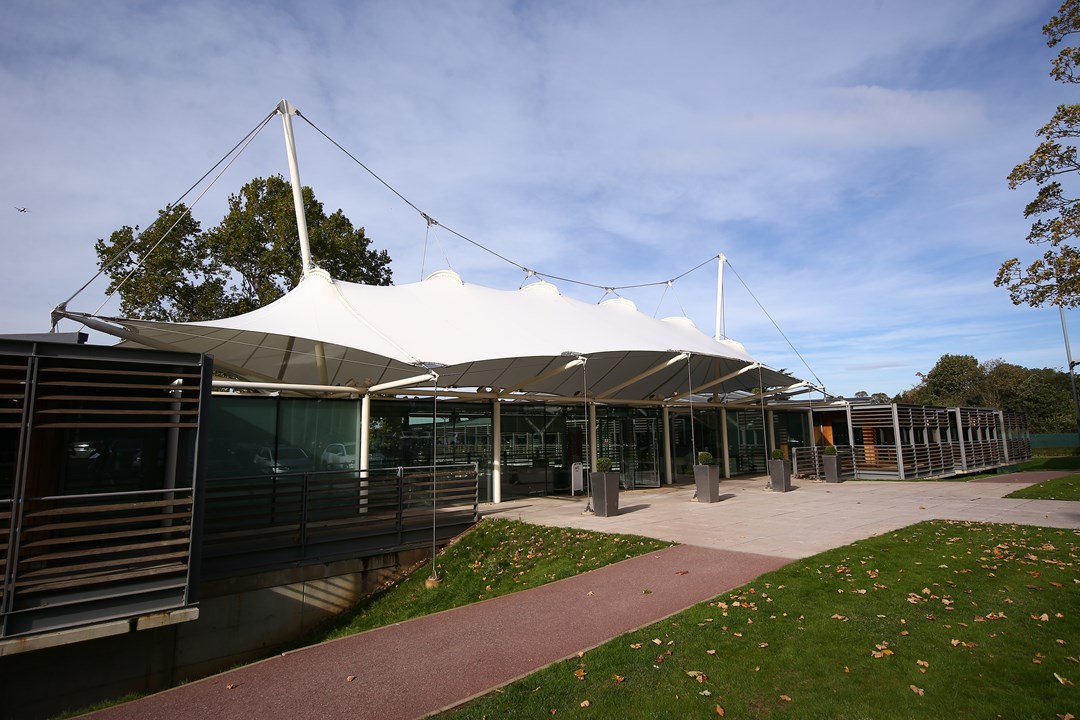 View of entrance to tennis court