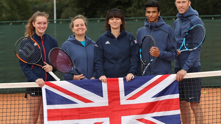 Team GB stood behind union jack flag