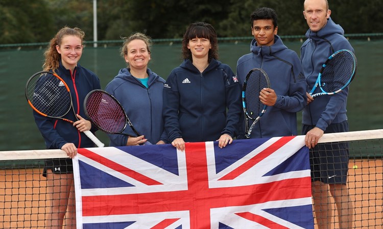 Team GB stood behind union jack flag
