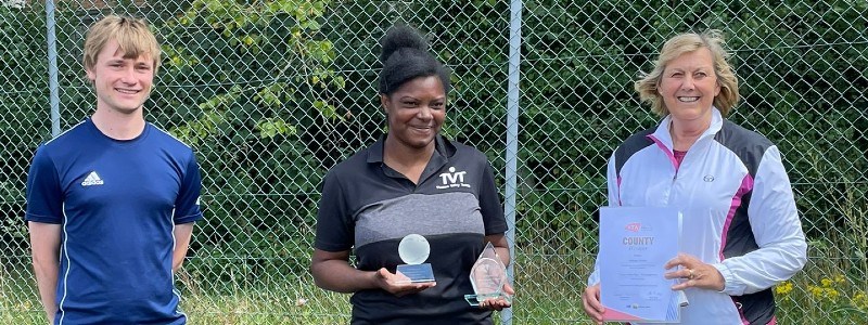 Mekaya being presented with her award