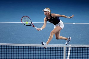 Harriet Dart reaches for a volley against Caroline Garcia at the Billie Jean King Cup