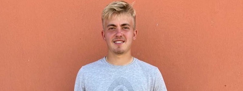 headshot image of felix gill smiling
