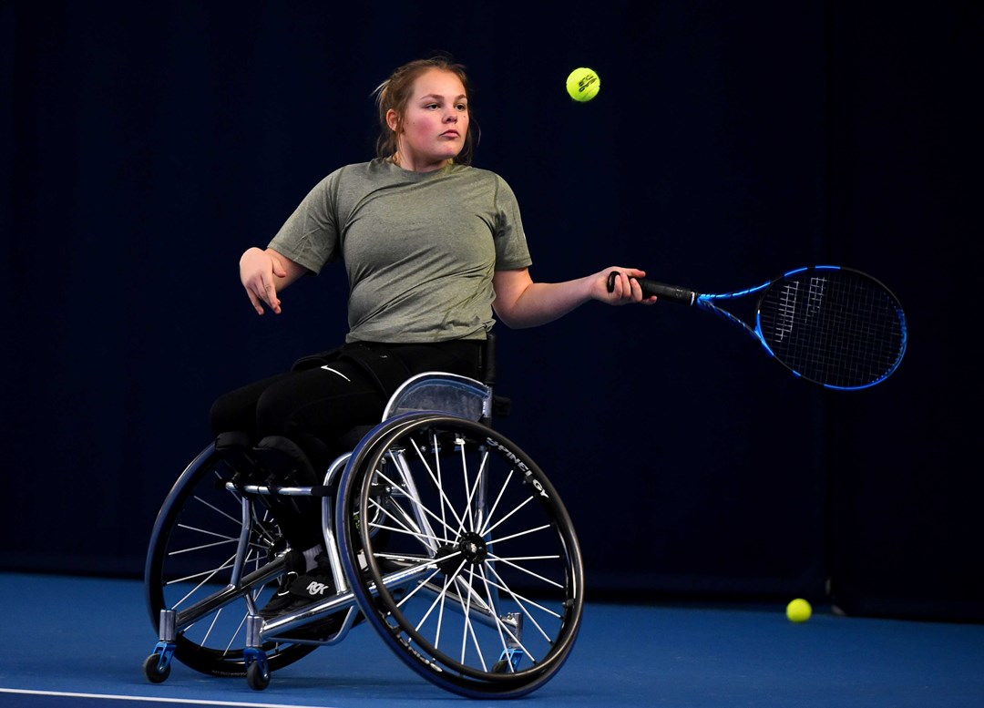 Female tennis player in a wheelchair