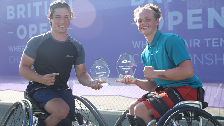 Handicapped players holding trophies