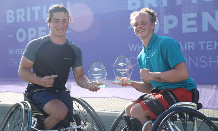 Handicapped players holding trophies