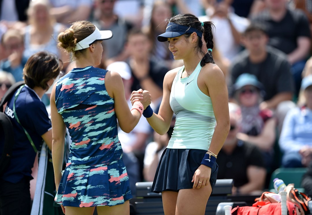 Two tennis players shaking hands