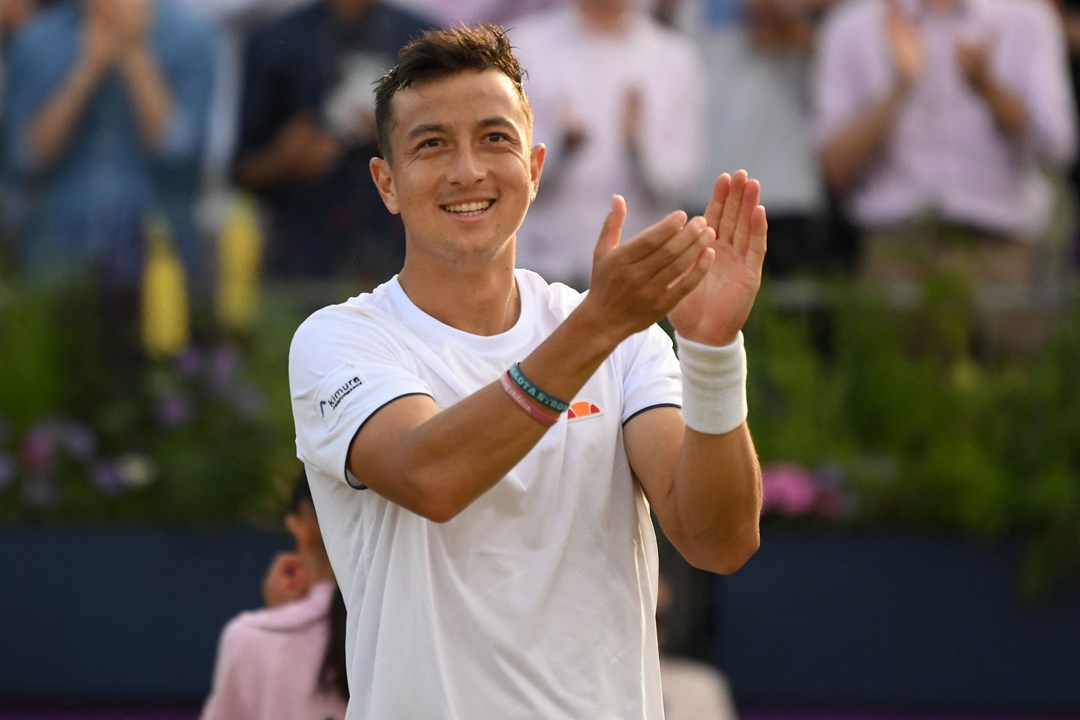 Male tennis player clapping