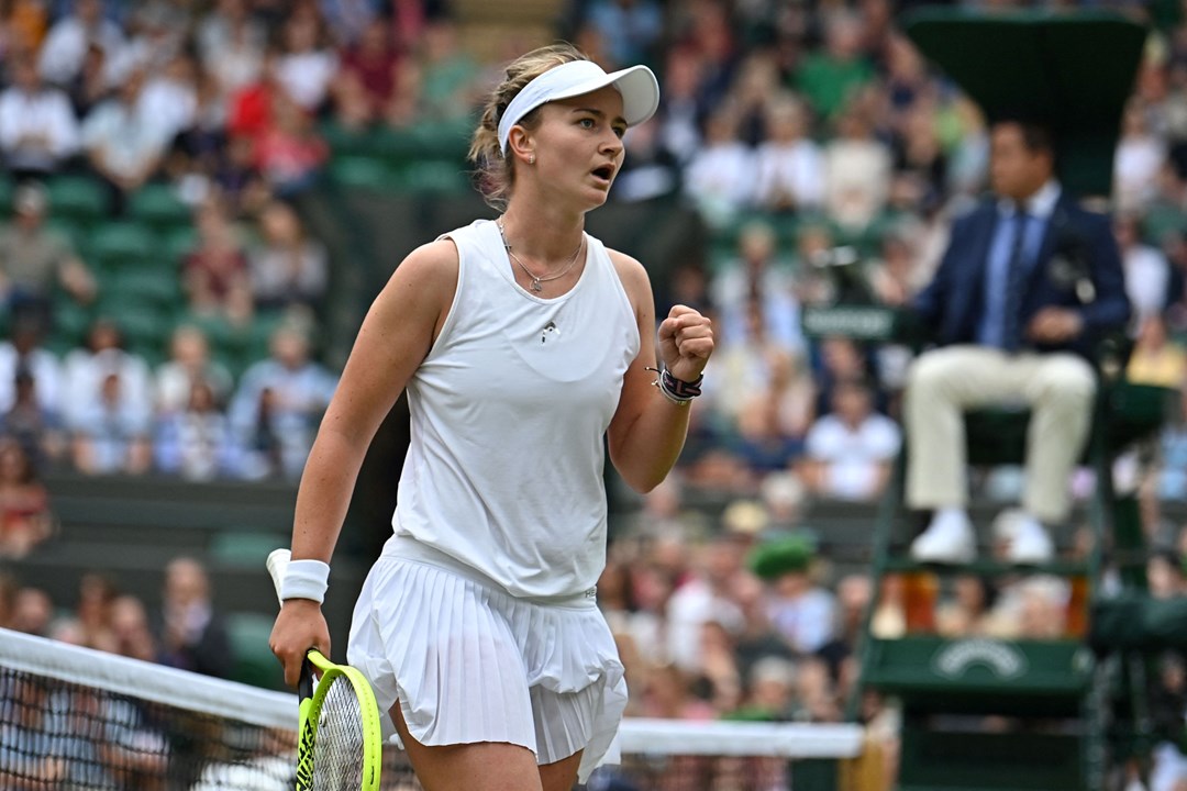 Barbora Krejicova winning a point and showing passion