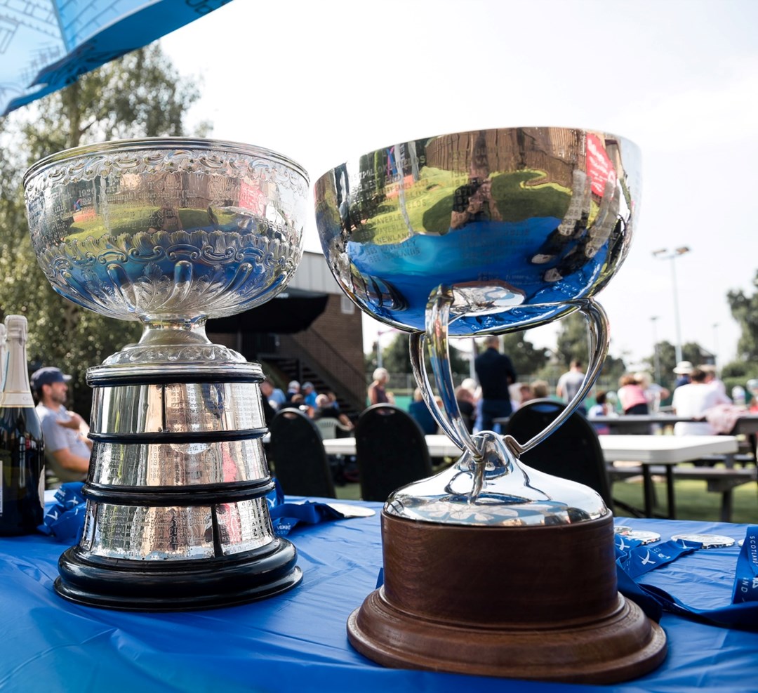 Two silver coloured trophies 