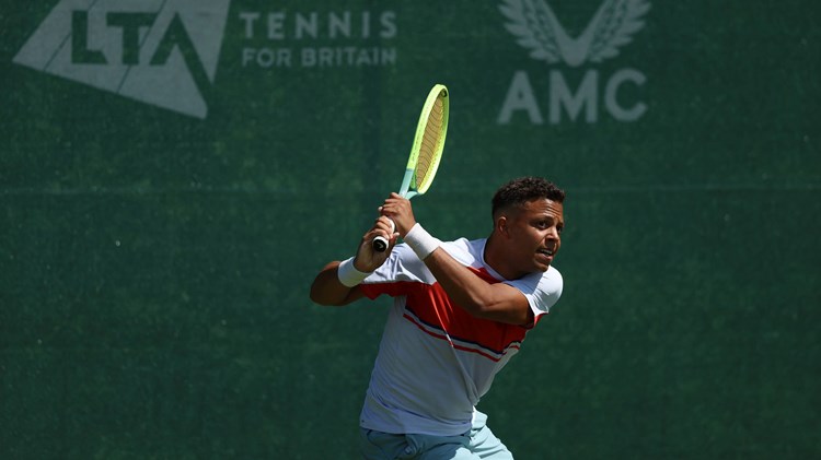 Jay Clarke hitting a backhand in training at the National Tennis Centre