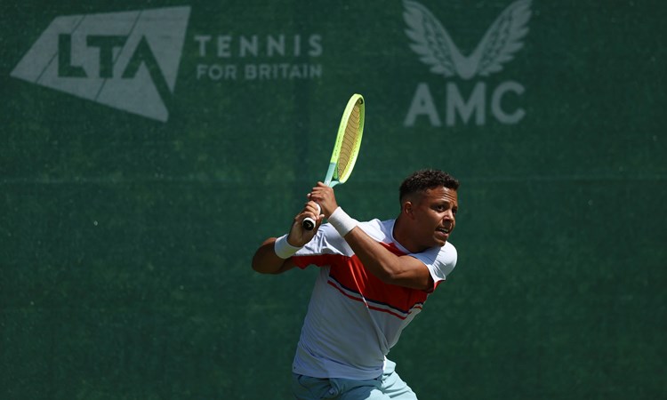 Jay Clarke hitting a backhand in training at the National Tennis Centre