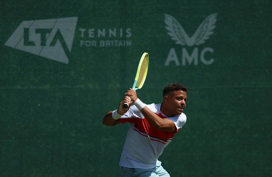 Jay Clarke hitting a backhand in training at the National Tennis Centre