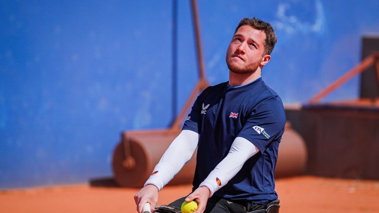 Alfie Hewett serving in the World Team Cup qualifiers 2022