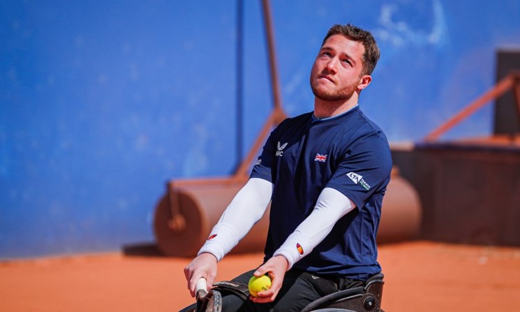 Alfie Hewett serving in the World Team Cup qualifiers 2022