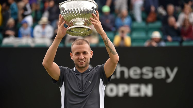 Dan Evans lifting a trophy at Rothesay open championship