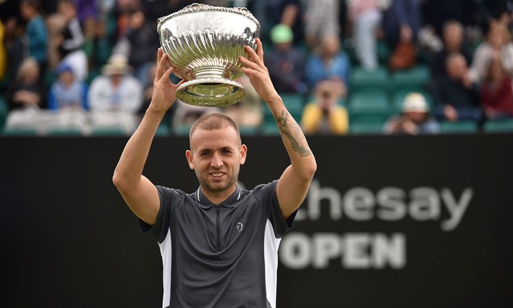 Dan Evans lifting a trophy at Rothesay open championship